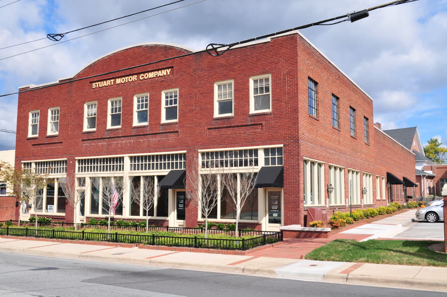 The historic Stuart Motor Company building, a brick storefront in downtown Kernersville